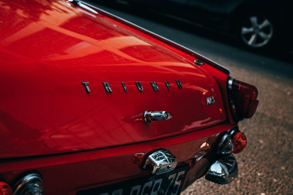 a close up of the trunk of a red car